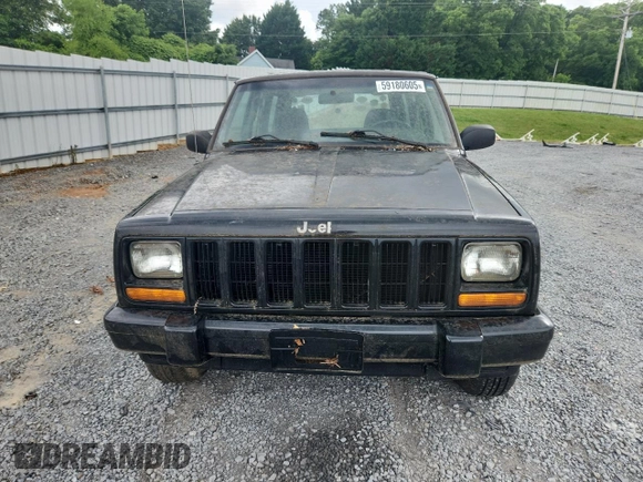 1999 Jeep Cherokee z VIN 1J4FF28P4XL560533, wystawiony jako Copart lot #59180605 z przebiegiem 190 262 mil mil oraz Czysty tytuł • Clean title. Historia ofert i sprzedaży dostępna na DreamBid. Obrazek 5.