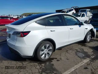 2022 Tesla Model Y Long Range with VIN 7SAYGDEE1NF402745, listed as a IAAI auction lot 41493850 with 11,222 mi miles and . Bid and sale history available at DreamBid. Image 4.