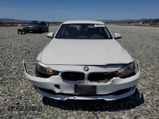2014 BMW 3 Series 320i with VIN WBA3B1C55EK133687, listed as a Copart auction lot 63049945 with 95,604 mi miles and Salvage title. Bid and sale history available at DreamBid. Image 5.
