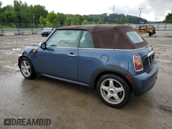 2009 MINI Convertible with VIN WMWMR33579TU96147, listed as a Copart auction lot 60124945 with 94,612 mi miles and Non repairable. Bid and sale history available at DreamBid. Image 2.
