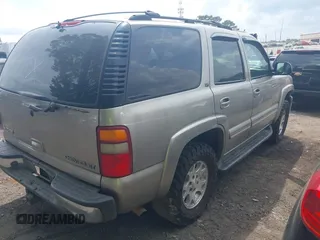 2003 Chevrolet Tahoe LT with VIN 1GNEC13Z73R247245, listed as a IAAI auction lot 42001442 with 263,939 mi miles. Bid and sale history available at carsss.com. Image 4.