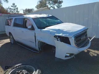 2019 GMC Yukon XL SLT with VIN 1GKS1GKC1KR335082, listed as a IAAI auction lot 41652504 with 135,824 mi miles. Bid and sale history available at carsss.com. Image 1.
