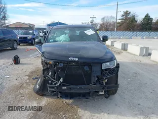 2018 Jeep Grand Cherokee Laredo E with VIN 1C4RJFAG7JC244103, listed as a IAAI auction lot 41260642 with 116,797 mi miles. Bid and sale history available at carsss.com. Image 12.