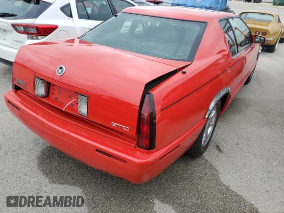 2002 Cadillac Eldorado z VIN 1G6EC129X2B106142, wystawiony jako Copart lot #74424164 z przebiegiem Nie podano mil oraz Szkoda całkowita • Salvage title. Historia ofert i sprzedaży dostępna na DreamBid. Obrazek 3.