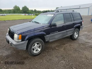 1998 Jeep Grand Cherokee Laredo with VIN 1J4GZ58SXWC144437, listed as a Copart auction lot 60437094 with 183,908 mi miles and Salvage Title. Bid and sale history available at carsss.com. Image 1.