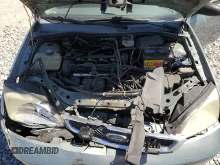 2005 Ford Focus S with VIN 1FAFP34NX5W200603, listed as a Copart auction lot 50146915 with 281,451 mi miles and Salvage Title. Bid and sale history available at DreamBid. Image 11.