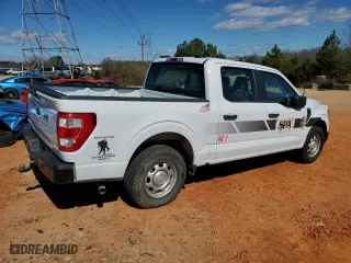 2023 Ford F-150 XL with VIN 1FTEW1CB8PKE69813, listed as a Copart auction lot 82370044 with 23,284 mi miles and Salvage Title. Bid and sale history available at carsss.com. Image 3.