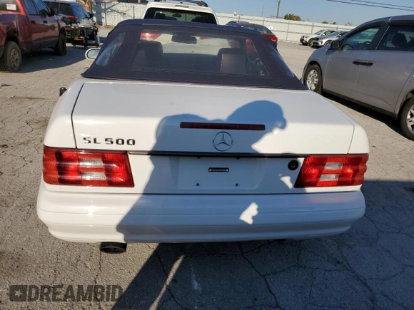 1999 Mercedes-Benz SL-Class with VIN WDBFA68F3XF183399, listed as a Copart auction lot 76908024 with 136,337 mi miles and Salvage Title. Bid and sale history available at carsss.com. Image 6.
