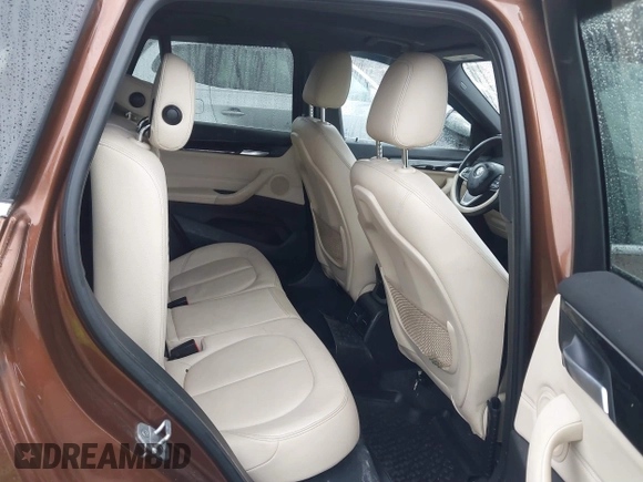 2016 BMW X1 xDrive28i with VIN WBXHT3C31GP881488, listed as a IAAI auction lot 41693116 with 120,922 mi miles. Bid and sale history available at carsss.com. Image 8.