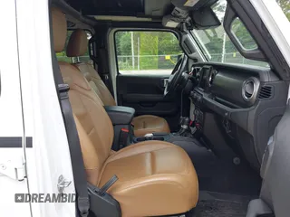 2021 Jeep Wrangler Unlimited Rubicon with VIN 1C4JJXFM9MW774142, listed as a IAAI auction lot 42625007 with 42,318 mi miles and . Bid and sale history available at DreamBid. Image 5.