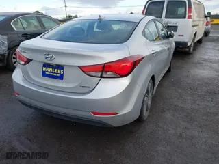2014 Hyundai Elantra SE with VIN KMHDH4AE8EU170548, listed as a IAAI auction lot 41789097 with 196,055 mi miles. Bid and sale history available at carsss.com. Image 4.