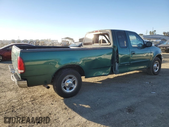 2000 Ford F-150 XL with VIN 1FTRX17W4YNB17453, listed as a Copart auction lot 52051215 with Not provided miles and Salvage title. Bid and sale history available at DreamBid. Image 3.