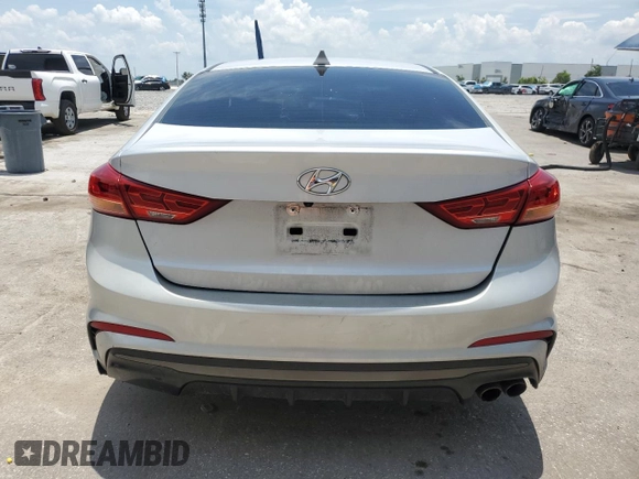2018 Hyundai Elantra Sport с VIN KMHD04LB8JU556486, выставлен на аукционе Copart как лот 58772815 с пробегом 105 307 миль миль и Списание • Salvage title. История ставок и продаж доступна на DreamBid. Изображение 6.