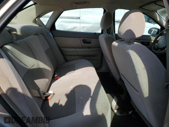 2005 Ford Taurus SE z VIN 1FAFP53215A212736, wystawiony jako Copart lot #58439495 z przebiegiem Nie podano mil oraz Szkoda całkowita • Salvage title. Historia ofert i sprzedaży dostępna na DreamBid. Obrazek 10.