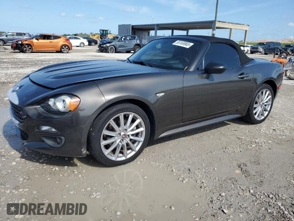 2017 FIAT 124 Spider Lusso z VIN JC1NFAEK7H0123436, wystawiony jako Copart lot #56169965 z przebiegiem 133 320 mil mil oraz Czysty tytuł • Clean title. Historia ofert i sprzedaży dostępna na DreamBid. Obrazek 1.