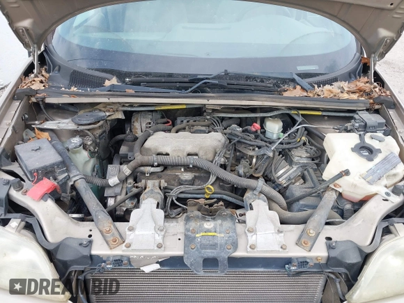 2003 Chevrolet Venture Y3G Mobility with VIN 1GNDX03E43D248244, listed as a IAAI auction lot 42196280 with 98,722 mi miles and . Bid and sale history available at DreamBid. Image 10.