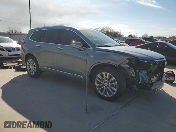2023 Cadillac XT6 FWD Premium Luxury with VIN 1GYKPCRS4PZ124119, listed as a Copart auction lot 87836515 with 14,752 mi miles and Salvage title. Bid and sale history available at DreamBid. Image 4.