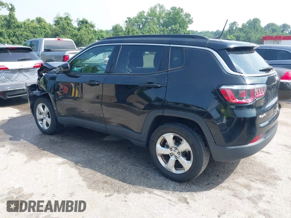 2018 Jeep Compass Latitude with VIN 3C4NJDBB2JT114644, listed as a IAAI auction lot 42499210 with 82,988 mi miles and . Bid and sale history available at DreamBid. Image 3.