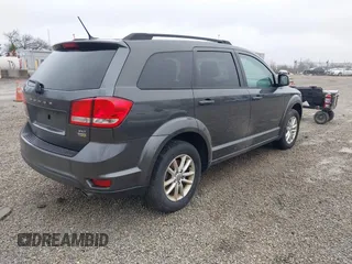 2016 Dodge Journey SXT with VIN 3C4PDCBG9GT137742, listed as a IAAI auction lot 41879431 with 207,443 mi miles. Bid and sale history available at carsss.com. Image 4.