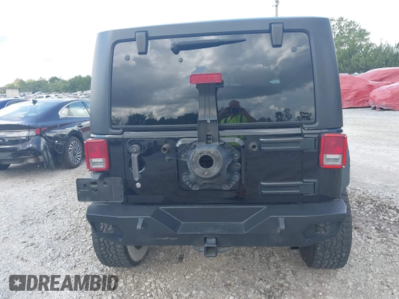 2012 Jeep Wrangler Sport z VIN 1C4AJWAG2CL286680, wystawiony jako IAAI lot #42434411 z przebiegiem 97 142 mil mil oraz . Historia ofert i sprzedaży dostępna na DreamBid. Obrazek 16.