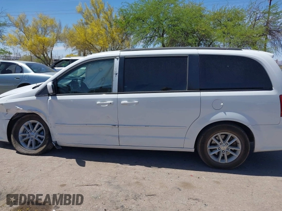 2014 Dodge Grand Caravan SXT with VIN 2C4RDGCG1ER429495, listed as a IAAI auction lot 42058513 with 136,936 mi miles and . Bid and sale history available at DreamBid. Image 14.
