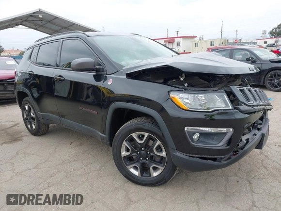 2018 Jeep Compass Trailhawk with VIN 3C4NJDDB3JT451658, listed as a IAAI auction lot 42087588 with 90,189 mi miles and . Bid and sale history available at DreamBid. Image 1.