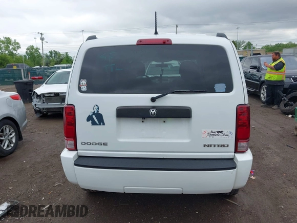 2011 Dodge Nitro Heat z VIN 1D4PU4GK7BW598432, wystawiony jako IAAI lot #42252036 z przebiegiem 148 329 mil mil oraz . Historia ofert i sprzedaży dostępna na DreamBid. Obrazek 16.