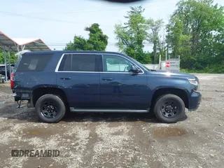 2019 Chevrolet Tahoe Commercial z VIN 1GNLCDEC1KR218436, wystawiony jako IAAI lot #42286365 z przebiegiem 119 981 mil mil oraz . Historia ofert i sprzedaży dostępna na DreamBid. Obrazek 13.