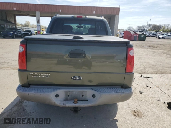 2003 Ford Explorer Sport Trac XLS with VIN 1FMZU77E43UB74698, listed as a Copart auction lot 54210645 with 207,678 mi miles and Salvage title. Bid and sale history available at DreamBid. Image 6.