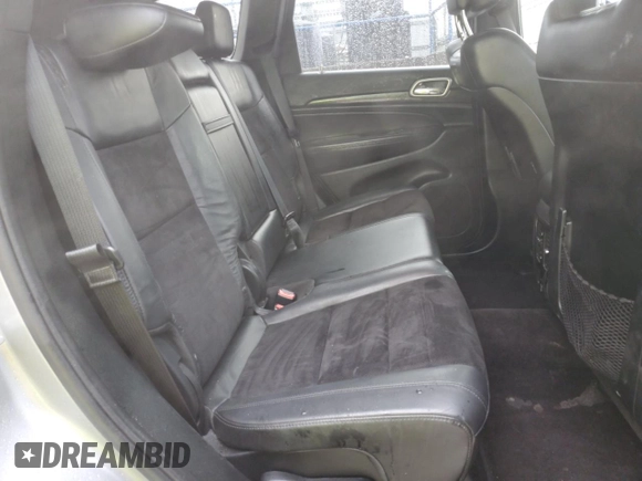 2018 Jeep Grand Cherokee Altitude with VIN 1C4RJEAG1JC197144, listed as a Copart auction lot 85280904 with 115,851 mi miles and Salvage Title. Bid and sale history available at carsss.com. Image 11.