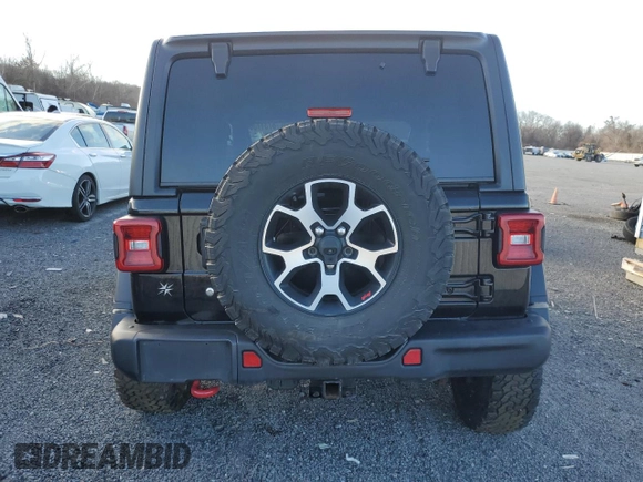 2020 Jeep Wrangler Rubicon с VIN 1C4HJXCG0LW194810, выставлен на аукционе Copart как лот 87317364 с пробегом 49 836 миль миль и Списание • Salvage title. История ставок и продаж доступна на DreamBid. Изображение 6.