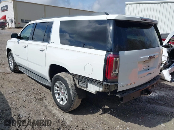 2016 GMC Yukon XL SLE with VIN 1GKS1FKC0GR331459, listed as a IAAI auction lot 41557718 with 203,803 mi miles. Bid and sale history available at carsss.com. Image 3.