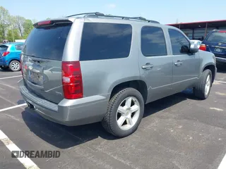2008 Chevrolet Tahoe LTZ with VIN 1GNFC13068R149644, listed as a IAAI auction lot 42003994 with 273,984 mi miles and . Bid and sale history available at DreamBid. Image 4.
