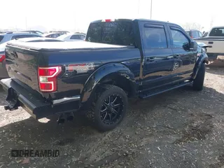 2018 Ford F-150 XL with VIN 1FTEW1E50JKF96277, listed as a IAAI auction lot 42130253 with 63,374 mi miles and . Bid and sale history available at DreamBid. Image 4.