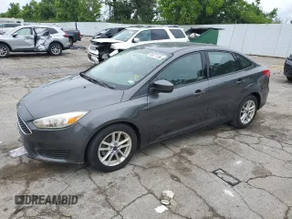 2018 Ford Focus SE z VIN 1FADP3FE2JL229934, wystawiony jako Copart lot #58671135 z przebiegiem 60 060 mil mil oraz Szkoda całkowita • Salvage title. Historia ofert i sprzedaży dostępna na DreamBid. Obrazek 1.