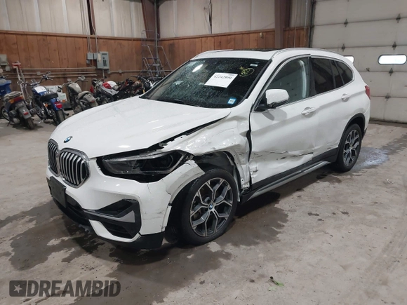 2021 BMW X1 xDrive28i with VIN WBXJG9C04M5T82884, listed as a IAAI auction lot 42242890 with 24,647 mi miles and . Bid and sale history available at DreamBid. Image 17.