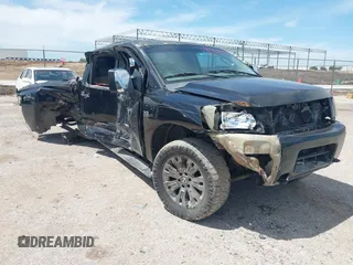 2004 Nissan Titan LE with VIN 1N6AA07B94N515805, listed as a IAAI auction lot 42289216 with 164,751 mi miles and . Bid and sale history available at DreamBid. Image 1.