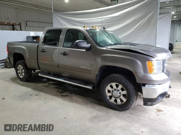 2012 GMC Sierra 2500HD SLE with VIN 1GT120CGXCF180421, listed as a Copart auction lot 56221405 with 62,006 mi miles and Salvage title. Bid and sale history available at DreamBid. Image 4.