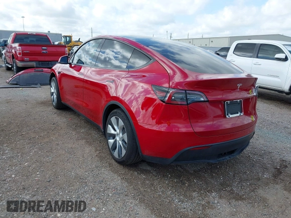 2020 Tesla Model Y Long Range with VIN 5YJYGDEE9LF009957, listed as a IAAI auction lot 41780248 with 31,053 mi miles and . Bid and sale history available at DreamBid. Image 3.