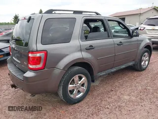 2012 Ford Escape XLT with VIN 1FMCU9DGXCKC23955, listed as a IAAI auction lot 42277339 with 181,738 mi miles and . Bid and sale history available at DreamBid. Image 4.