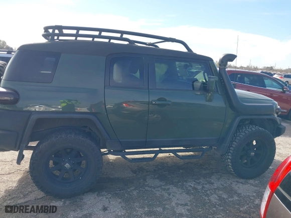 2014 Toyota FJ Cruiser with VIN JTEBU4BFXEK192640, listed as a IAAI auction lot 41349553 with 49,308 mi miles. Bid and sale history available at carsss.com. Image 13.