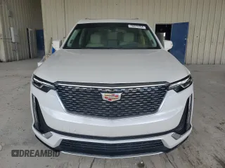 2023 Cadillac XT6 FWD Premium Luxury with VIN 1GYKPCRS4PZ103819, listed as a Copart auction lot 76279704 with 19,601 mi miles and Clean Title. Bid and sale history available at carsss.com. Image 5.