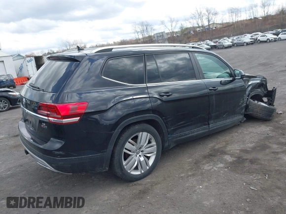 2019 Volkswagen Atlas SE z VIN 1V2UR2CA6KC580992, wystawiony jako IAAI lot #41902265 z przebiegiem 63 233 mil mil oraz . Historia ofert i sprzedaży dostępna na DreamBid. Obrazek 4.