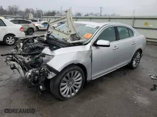 2015 Lincoln MKS with VIN 1LNHL9EK5FG607404, listed as a Copart auction lot 43246995 with 0 mi miles and Salvage Title. Bid and sale history available at carsss.com. Image 1.