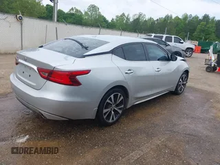 2016 Nissan Maxima SR with VIN 1N4AA6AP7GC430106, listed as a IAAI auction lot 42061991 with 186,775 mi miles and . Bid and sale history available at DreamBid. Image 4.