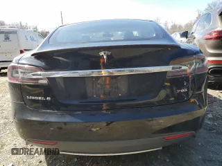 2014 Tesla Model S 60 with VIN 5YJSA1H10EFP34137, listed as a Copart auction lot 47645795 with Not provided miles and Salvage title. Bid and sale history available at DreamBid. Image 6.