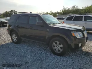 2009 Mercury Mariner with VIN 4M2CU81709KJ01613, listed as a Copart auction lot 71571944 with 103,559 mi miles and Salvage Title. Bid and sale history available at carsss.com. Image 4.