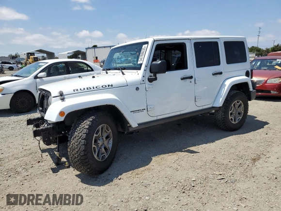 2015 Jeep Wrangler Unlimited Rubicon with VIN 1C4BJWFG6FL508493, listed as a Copart auction lot 54788635 with 127,694 mi miles and Salvage title. Bid and sale history available at DreamBid. Image 1.