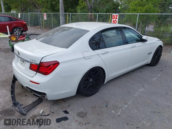 2013 BMW 7 Series 740i with VIN WBAYA6C52DD143862, listed as a IAAI auction lot 41859183 with 133,666 mi miles. Bid and sale history available at carsss.com. Image 4.