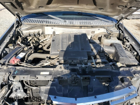 2011 Lincoln Navigator z VIN 5LMJJ2H54BEJ04714, wystawiony jako Copart lot #83490764 z przebiegiem 82 685 mil mil oraz Szkoda całkowita • Salvage title. Historia ofert i sprzedaży dostępna na DreamBid. Obrazek 14.